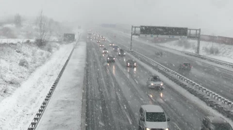 Heavy snowfall on German highway Видео 45612550