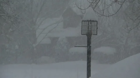 Heavy snowfall lamppost Stock Footage 34452559