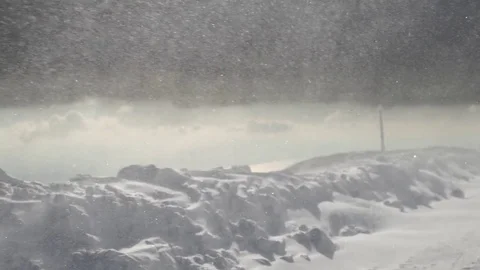 Heavy snowfall on mountain Stock Footage 77805804