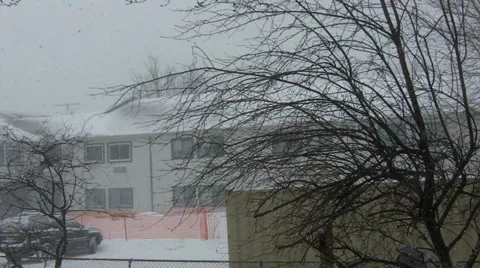 Heavy snowfall over a building 1080p Stock Footage 34398886