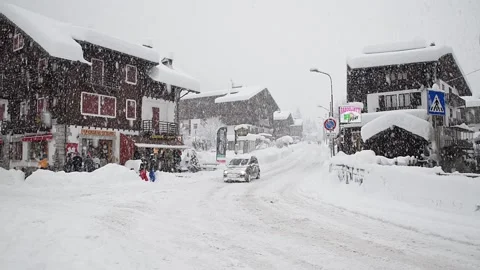 Heavy snowfall in a ski resort in the Alps, Macugnaga, Italy Stock Footage 221237952