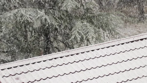 Heavy Snowfall On Snow Covered Shingled Roof Of A Residential Home Stock Footage 167683375