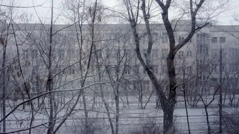 Heavy snowfall in town on a winter day. Stock Footage 130145091
