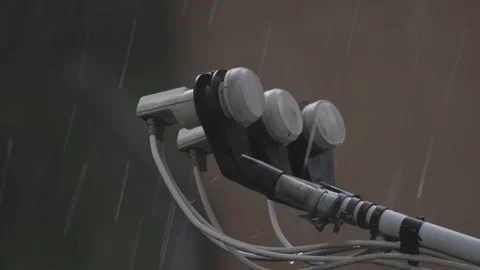 Heavy spring rainfall with parabolic antenna Stock Footage 307430276