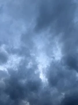 Heavy Storm Clouds with Bright Opening Stock Photos