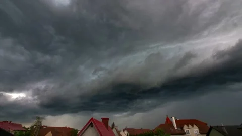 Heavy Storm Clouds Moving Over CIty Time Lapse Stock Footage 133551527