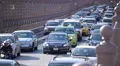 Heavy street traffic jammed cars commute Brooklyn Bridge New York City NYC day 4k or 4k+ Resolution