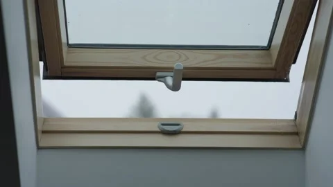 Heavy summer rain open attic window view. opened double attic window during rain Stock Footage 236330913