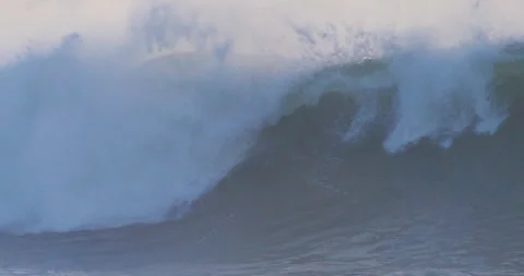 Heavy surf waves breaking rough sea dramatic slow motion Video stock 330919884