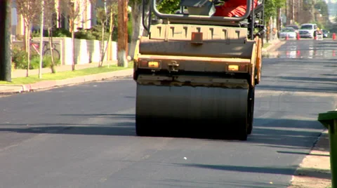 Heavy tandem Vibration roller compactor at asphalt pavement  Stock Footage 34513319