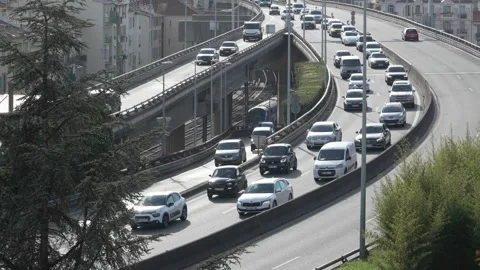 Heavy Traffic and Train in Elevated City Highway. Stock Footage 329585644