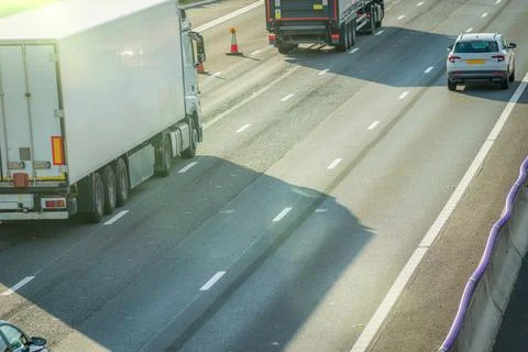 Heavy traffic in blurry motion on UK motorway in England 스톡 사진