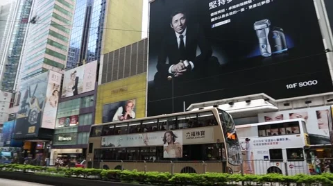 Heavy traffic buses and trams in the central streets of the metropolis, Hong Kon Stock Footage 50587977