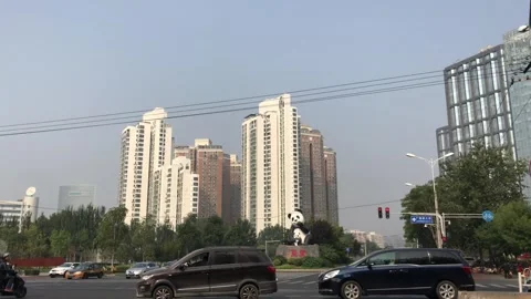 Heavy traffic circulating in a modern Beijing city street Video stock 341401214