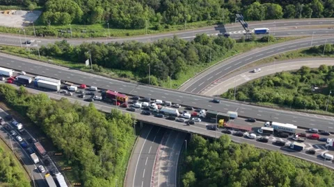 Heavy Traffic Congestion on a Complex Highway Interchange in Daylight Stock Footage 335292144