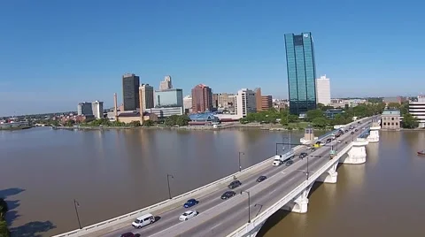 Heavy Traffic crossing bridge in front of Toledo, Ohio Skyline Stock Footage 43737044