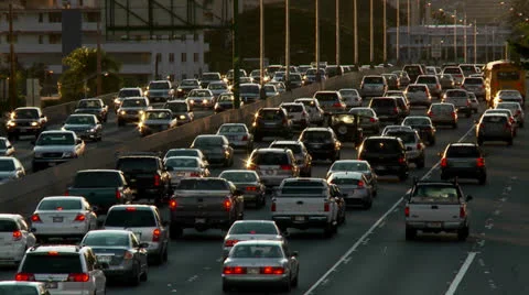 Heavy traffic crowds Honolulu's freeways in Hawaii. Stock Footage
