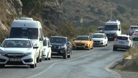 Heavy Traffic Hillside Road Slow Motion Stock Footage 144328202