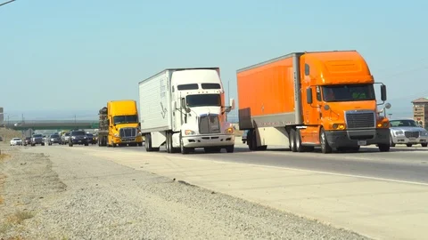 Heavy traffic on Interstate highway 5. Cars and trucks on the road. California Stock-Footage 86280717