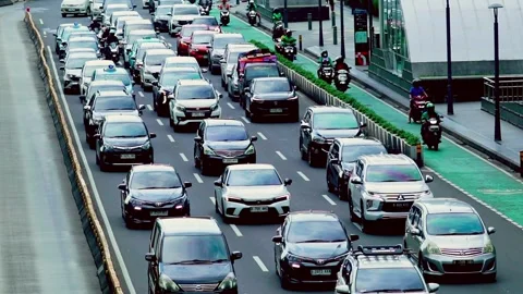 Heavy traffic jam on MH Thamrin Street 2 Stock Footage 329829476