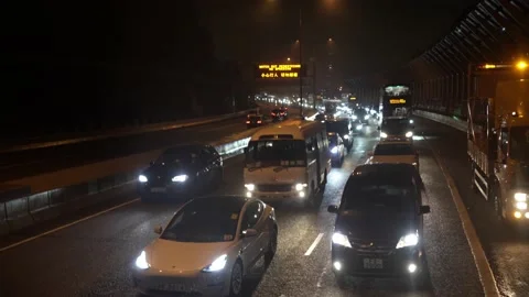 Heavy Traffic Jam Rainy Night, view from a car, Tuen Mun, Hong Kong Video stock 230055564