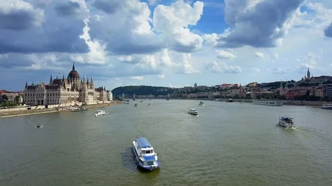 Heavy traffic with lots of sightseeing ships on River Danube Stock Footage 90905460