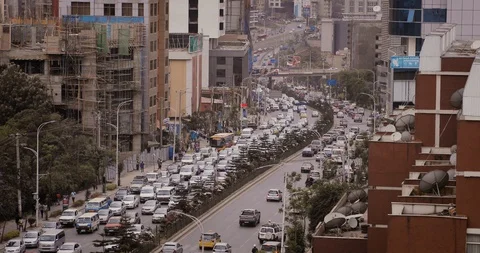 Heavy Traffic Moving Through Downtown Addis Ababa, Ethiopia Stock Footage 128065880