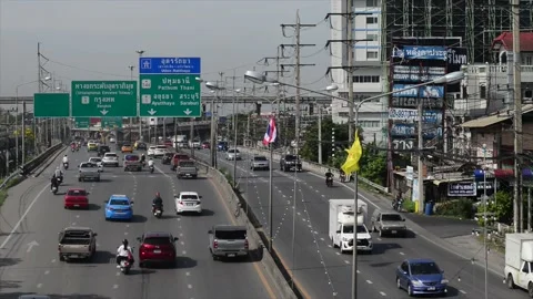 Heavy traffic in Pathum Tani district Bangkok Thailand Stock Footage 229464604