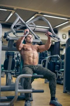 Heavy training on the Simulator. fun in the gym. healthy lifestyle Stock Photos