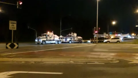 Heavy Transport Enters Intersection Stock Footage 131719845