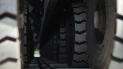 Heavy transport platform wheels starting to move Stock Footage 345081965