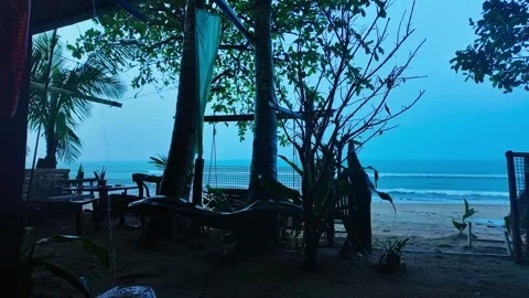 Heavy tropical rain timelapse at beach hut Alimanguan Palawan Philippines Stock Footage 333812950