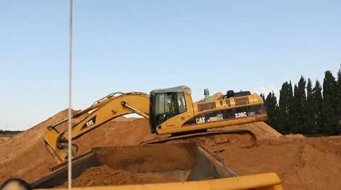 Heavy vehicles Heavy mining soil loader road vehicles truck digging Asphalt 動画素材 10717386