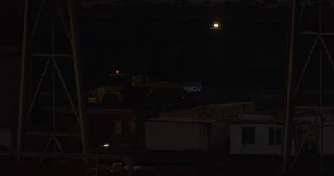 Heavy Vehicles Operating at Mining Site, At Night Stock Footage 317591986