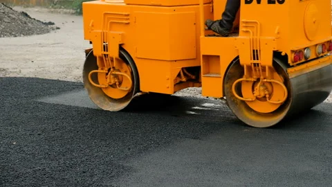 Heavy vibration roller machine equipment at asphalt pavement press works. Stock-Footage 89155985
