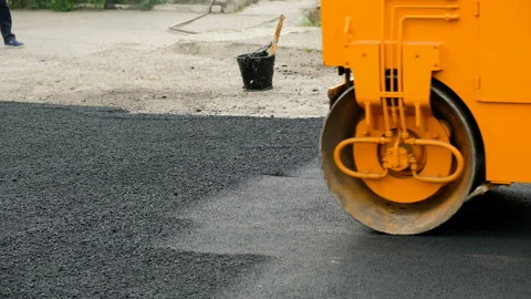Heavy vibration roller machine equipment at asphalt pavement press works. Stock-Footage 89156064