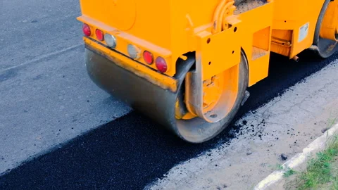 Heavy vibration roller machine equipment at asphalt pavement press works. Stock-Footage 90635348
