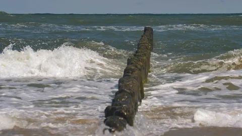 Heavy Waves on Baltic Sea and Breakwater Poles During Storm Slow Motion Stock Footage 116031985