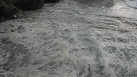Heavy waves reaching a beach in Galicia, Spain Stock Footage 303671077