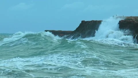 Heavy waves roll against the cliffs in Spain. Stock Footage 135350778