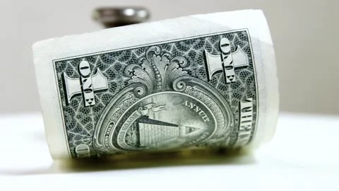 Heavy weight is on the US dollar banknote Stock Footage 307769525