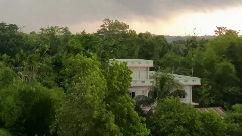 Heavy wind and thunder over rural village in Bangladesh before monsoon storm Видео 331784369