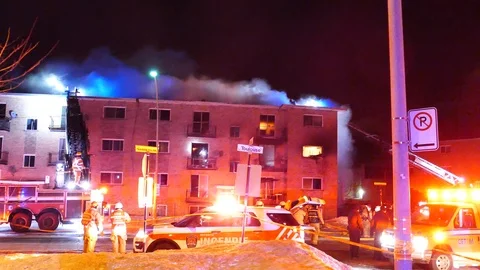 Heavy wind complicating firefighters work Stock Footage 104300583