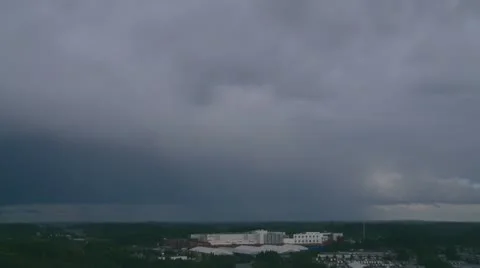 Heavyt clouds moving over an industrial complex Stock Footage 10790123