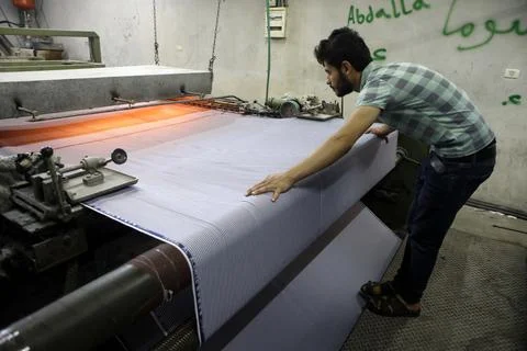Hebron's only textil factory for schoolgirls uniforms, --- - 22 Aug 2019 Stock Photos
