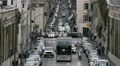 Hectic traffic in old European town, cars, motorbikes and buses driving on road HD Footage