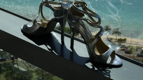 Heels and Window Close-Up Stock Footage 104684882