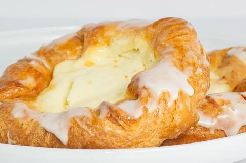 ?heese filled danish on white background Stock Photos