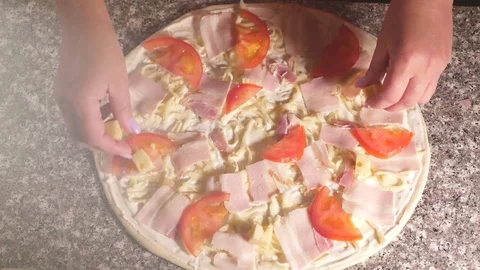 Hef hand making italian pizza at kitchen closeup. The process of cooking pizza Stock Footage 80358947
