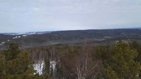 From a height above the forest Stock Footage 148198404